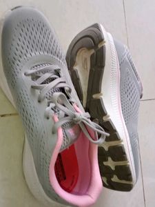Gray Running Shoes with Pink Accents