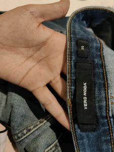 Distressed Blue Denim Jeans