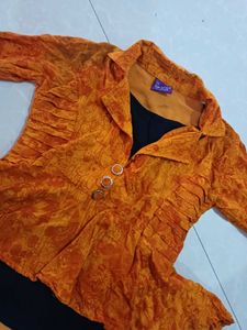 Vibrant Orange Textured Blouse