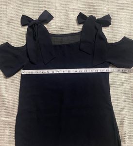 Chic Black Cold Shoulder Top with Bow Accents