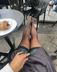 Sheer Thigh-High Stockings with Green Lace Trim