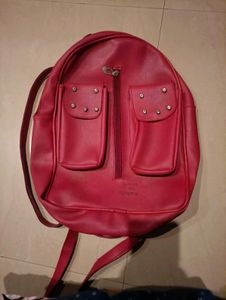 Red Backpack with Studded Pockets