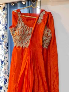Stunning Orange Embroidered Lehenga Choli