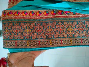Elegant Teal Saree with Embroidered Border