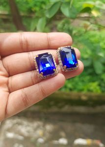 Classic Sapphire Earrings With Diamonds Around It