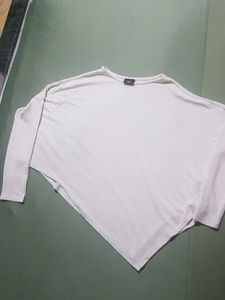 White asymmetrical sweater