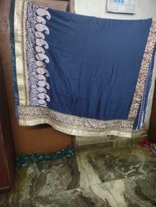 Elegant Navy Blue Saree with Gold Embellishments