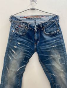 Distressed Denim Jeans