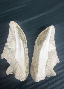 New Balance White Slip-On Sneakers