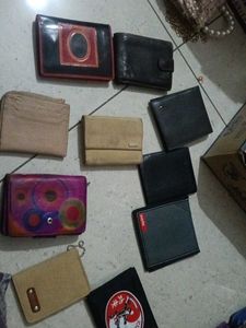Assorted Wallets - Various Styles ( one piece 300)