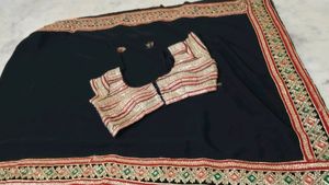 Embroidered saree with heavy stiched blouse