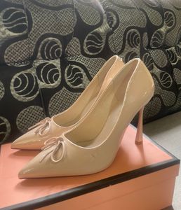 Elegant Nude Patent Bow Pumps