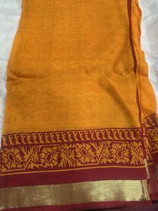 Vibrant Orange Saree with Maroon Border