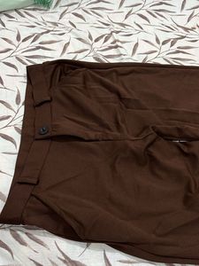 Chic Brown Wide-Leg Pants and tank top from Savana