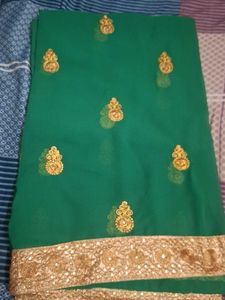 Elegant Green Saree with Gold Embroidery