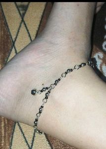 Anklet with black beads and charms