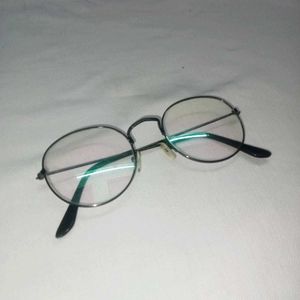 minimal round glasses.