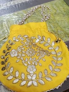 Vibrant Yellow Embroidered Potli Bag