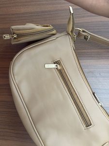 Chic Tan Shoulder Bag with Chain Detail
