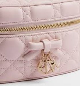 Quilted Pink Clutch with Bow Detail