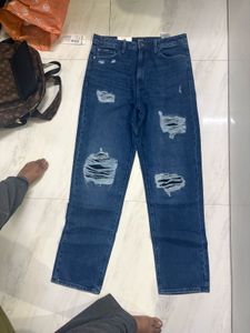 Distressed Blue Denim Jeans