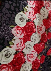Vibrant Rose Print bedsheet and golden earring