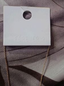 2 Golden Chains with pendant