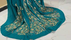 Elegant Teal Embroidered Saree