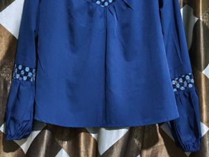 Stylish Blue Top with Embellished Neckline