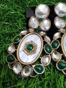 Elegant Oval Earrings with Green Stones