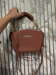 Chic Brown Handbag with Gold Chain Strap
