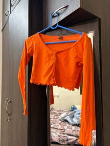 Orange Lettuce Hem Crop Top