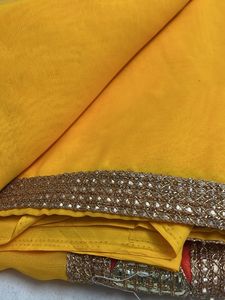 Vibrant Yellow Embellished Saree