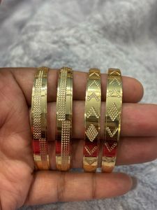 Set of 4 Gold Tone Bangles