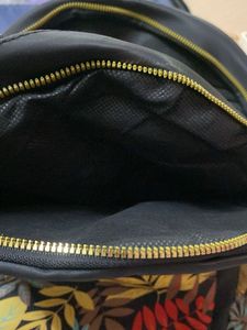 Stylish Black Backpack with Leaf Print