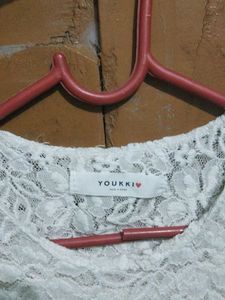 Elegant White Lace Peplum Top