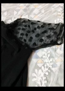 Chic Black Top with Polka Dot puff Sleeves