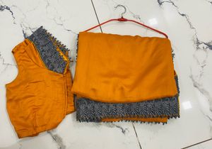 Elegant Yellow Saree with Grey Lace Border