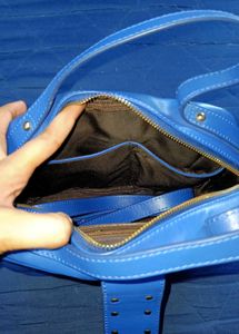 Vibrant Blue Handbag with Embellished Clasp