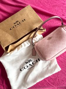 Coach Nolita - Pink monogram