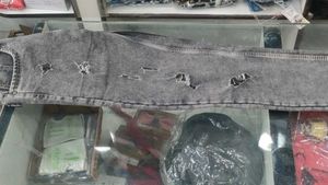 Ripped Grey Jeans