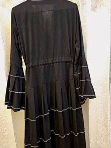 elegant black umbrella abaya with white tiers