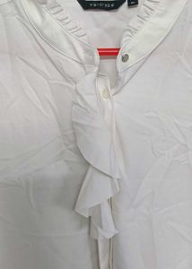 Chic White Ruffle Front Top of westside brand