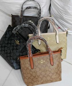 Coach Monogram Tote Bag with Charms