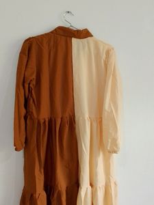 an elegant double coloured round frock