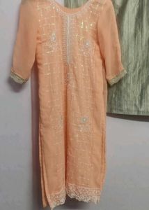 orange kurta set with beads work