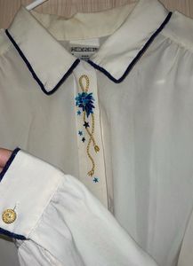 Elegant Cream Blouse with Blue Embroidery