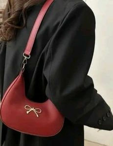 Chic Red Shoulder Bag with Bow Accent