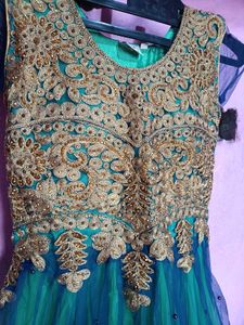 Elegant flared teal blue and green embroidery gown