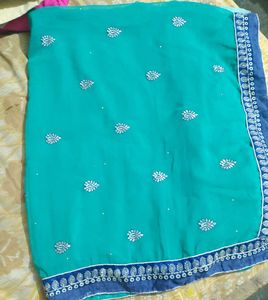 Elegant Teal Embroidered Saree